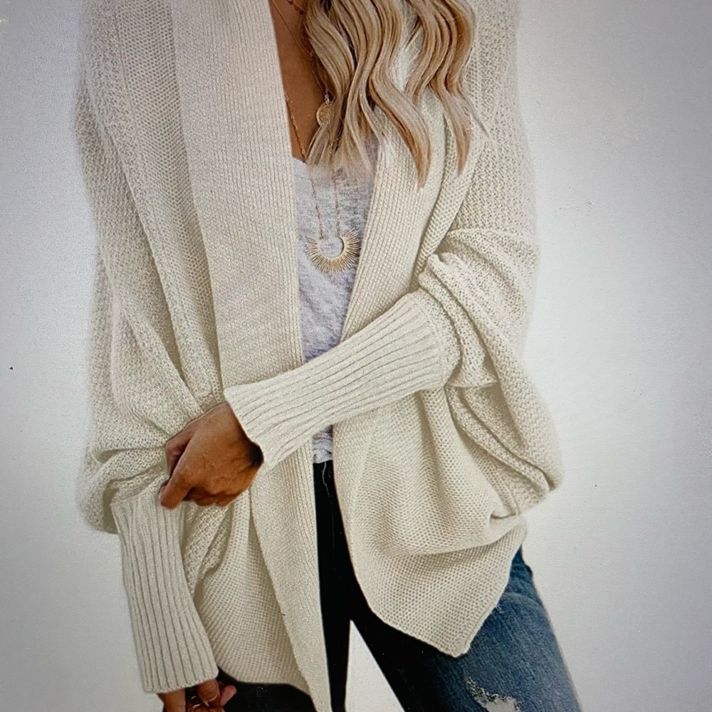Batwing sleeves off white/cream oversized loose sweater. Medium